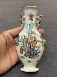 A pair of Chinese famille rose wall vases and a 'gu' vase, 19/20th C.