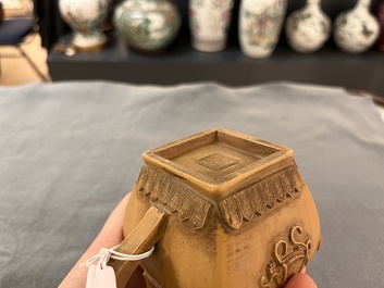 Two Chinese Yixing stoneware teapots, seal marks, 19th C.