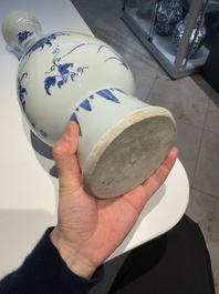 A Chinese blue and white pear-shaped vase with floral design, Transitional period