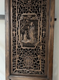 Four Chinese carved and openworked wooden doors, early 20th C.