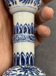A Chinese blue and white goblet, a salt and a vase, Kangxi