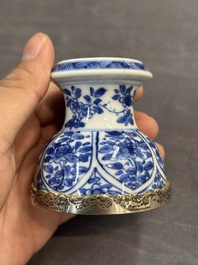 A Chinese blue and white goblet, a salt and a vase, Kangxi