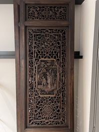 Four Chinese carved and openworked wooden doors, early 20th C.