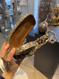 A pair of Japanese lacquered and 'raden' mother-of-pearl-inlaid 'abumi' stirrups, Edo, 18/19th C.