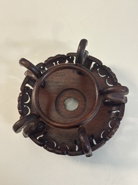 A collection of 11 Chinese wooden stands, 19/20th C.