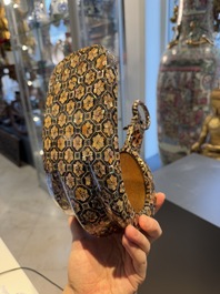 A pair of Japanese lacquered and 'raden' mother-of-pearl-inlaid 'abumi' stirrups, Edo, 18/19th C.