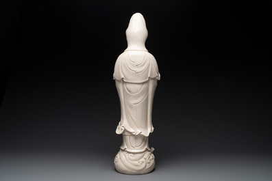 A large Chinese Dehua blanc de Chine group of a Bodhisattva with child, 20th C.