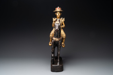A Burmese gilt-lacquered Nat horse rider, 19/20th C.