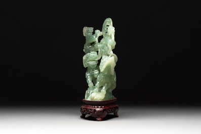 Three Chinese jade carvings, 20th C.