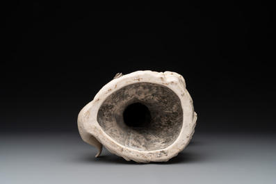 A large Chinese Dehua blanc de Chine Guanyin with a ruyi, 20th C.