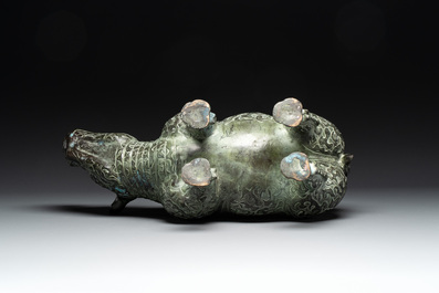 Two large Chinese archaistic bronze rhino- and melon-form vessels, 20th C.