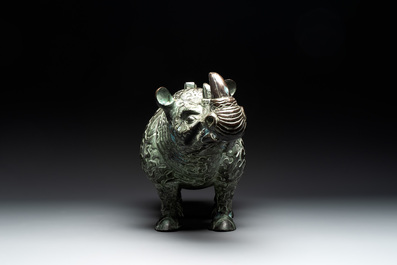 Two large Chinese archaistic bronze rhino- and melon-form vessels, 20th C.