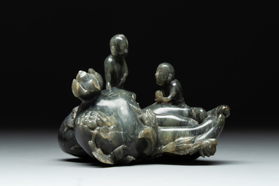 Three Chinese jade carvings, 20th C.