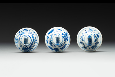 A Chinese blue and white garniture of five vases with river landscapes, 19th C.