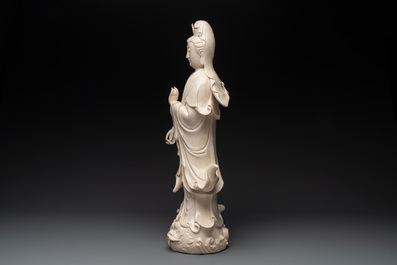 A large Chinese Dehua blanc de Chine Guanyin with a ruyi, 20th C.