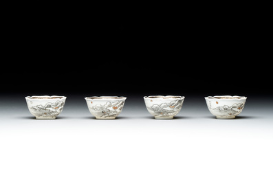 A set of four Chinese gilt-decorated grisaille 'landscape' cups and saucers, Yongzheng/Qianlong