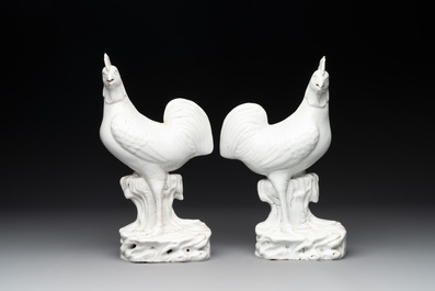 A pair of Chinese Dehua blanc de Chine models of roosters, 18th C.