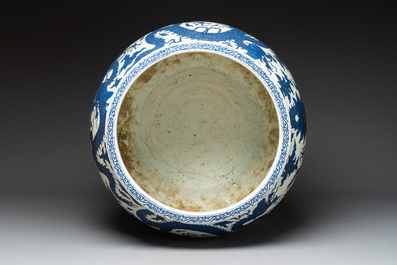 A massive Chinese blue and white 'dragon' fish bowl, Jiajing mark, 20th C.