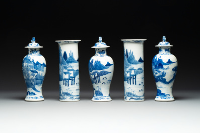 A Chinese blue and white garniture of five vases with river landscapes, 19th C.