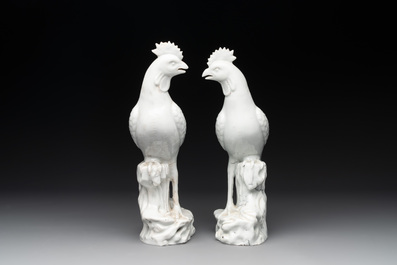 A pair of Chinese Dehua blanc de Chine models of roosters, 18th C.
