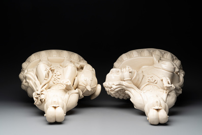 A pair of large Chinese Dehua blanc de Chine Bodhisattvas seated on an elephant and a Buddhist lion, 20th C.