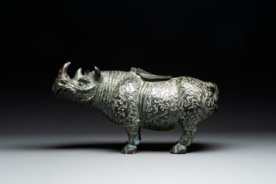 Two large Chinese archaistic bronze rhino- and melon-form vessels, 20th C.