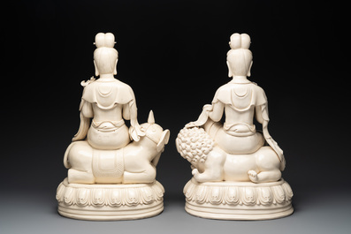 A pair of large Chinese Dehua blanc de Chine Bodhisattvas seated on an elephant and a Buddhist lion, 20th C.