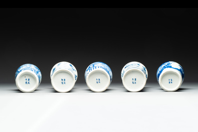 A Chinese blue and white garniture of five vases with river landscapes, 19th C.