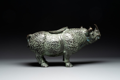 Two large Chinese archaistic bronze rhino- and melon-form vessels, 20th C.