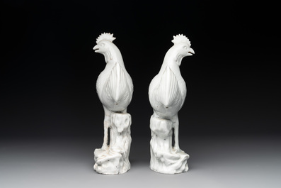 A pair of Chinese Dehua blanc de Chine models of roosters, 18th C.