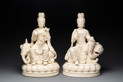 A pair of large Chinese Dehua blanc de Chine Bodhisattvas seated on an elephant and a Buddhist lion, 20th C.