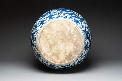 A massive Chinese blue and white 'dragon' fish bowl, Jiajing mark, 20th C.
