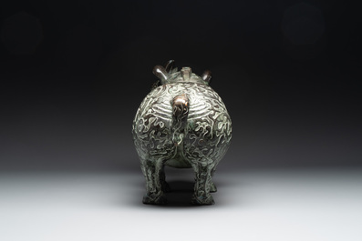 Two large Chinese archaistic bronze rhino- and melon-form vessels, 20th C.