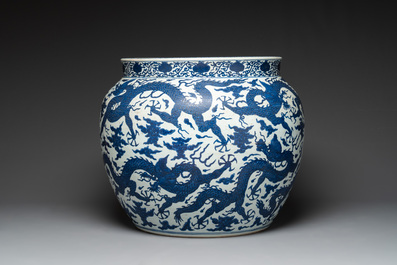 A massive Chinese blue and white 'dragon' fish bowl, Jiajing mark, 20th C.