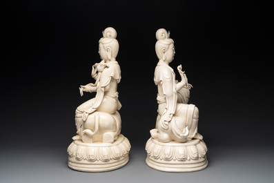 A pair of large Chinese Dehua blanc de Chine Bodhisattvas seated on an elephant and a Buddhist lion, 20th C.