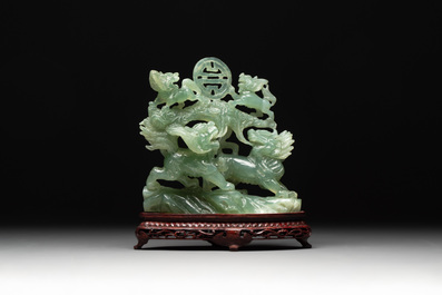 Three Chinese jade carvings, 20th C.