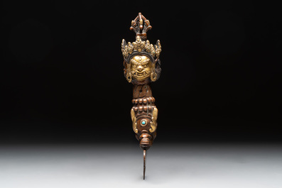 A Tibetan turquoise-inlaid copper alloy ritual kartika, 18/19th C.