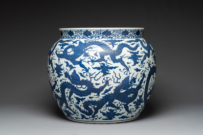 A massive Chinese blue and white 'dragon' fish bowl, Jiajing mark, 20th C.