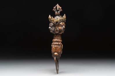 A Tibetan turquoise-inlaid copper alloy ritual kartika, 18/19th C.
