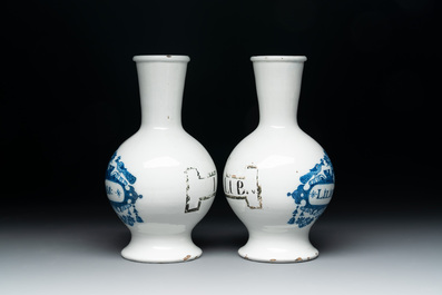 A fine pair of blue and white Dutch Delft pharmacy bottles, 18th C.