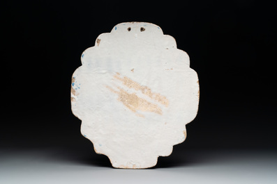 A blue and white Dutch Delft 'Crucifixion' plaque, 18th C.