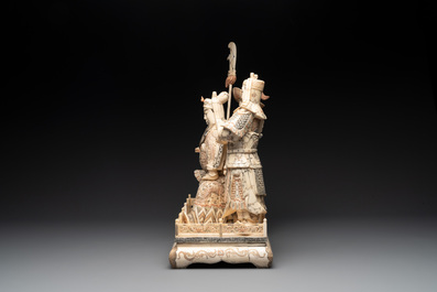 A Chinese bone-veneered group of Guandi and his attendents, 20th C