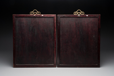 A pair of Chinese famille rose plaques in wooden frames, 20th C.