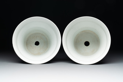 A pair of Chinese blue and white 'birds among flowering branches' jardini&egrave;res, 19th C.