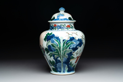 A Chinese wucai vase and cover with court ladies and playing boys, Transitional period