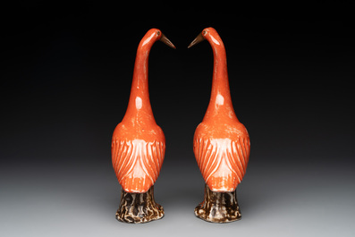 A pair of Chinese white-glazed Buddhist lions, a pair of doves and a pair of iron-red-decorated cranes, Ming and later