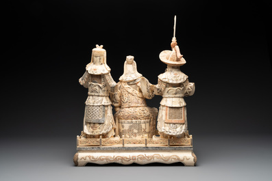 A Chinese bone-veneered group of Guandi and his attendents, 20th C