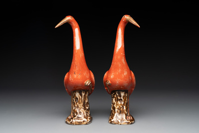 A pair of Chinese white-glazed Buddhist lions, a pair of doves and a pair of iron-red-decorated cranes, Ming and later