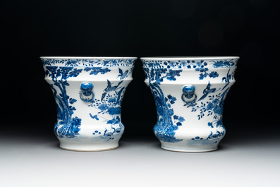 A pair of Chinese blue and white 'birds among flowering branches' jardini&egrave;res, 19th C.