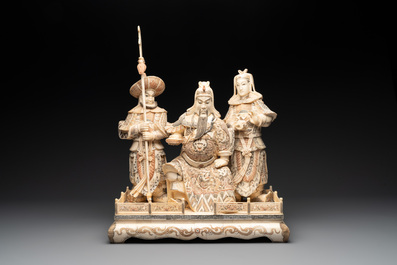 A Chinese bone-veneered group of Guandi and his attendents, 20th C
